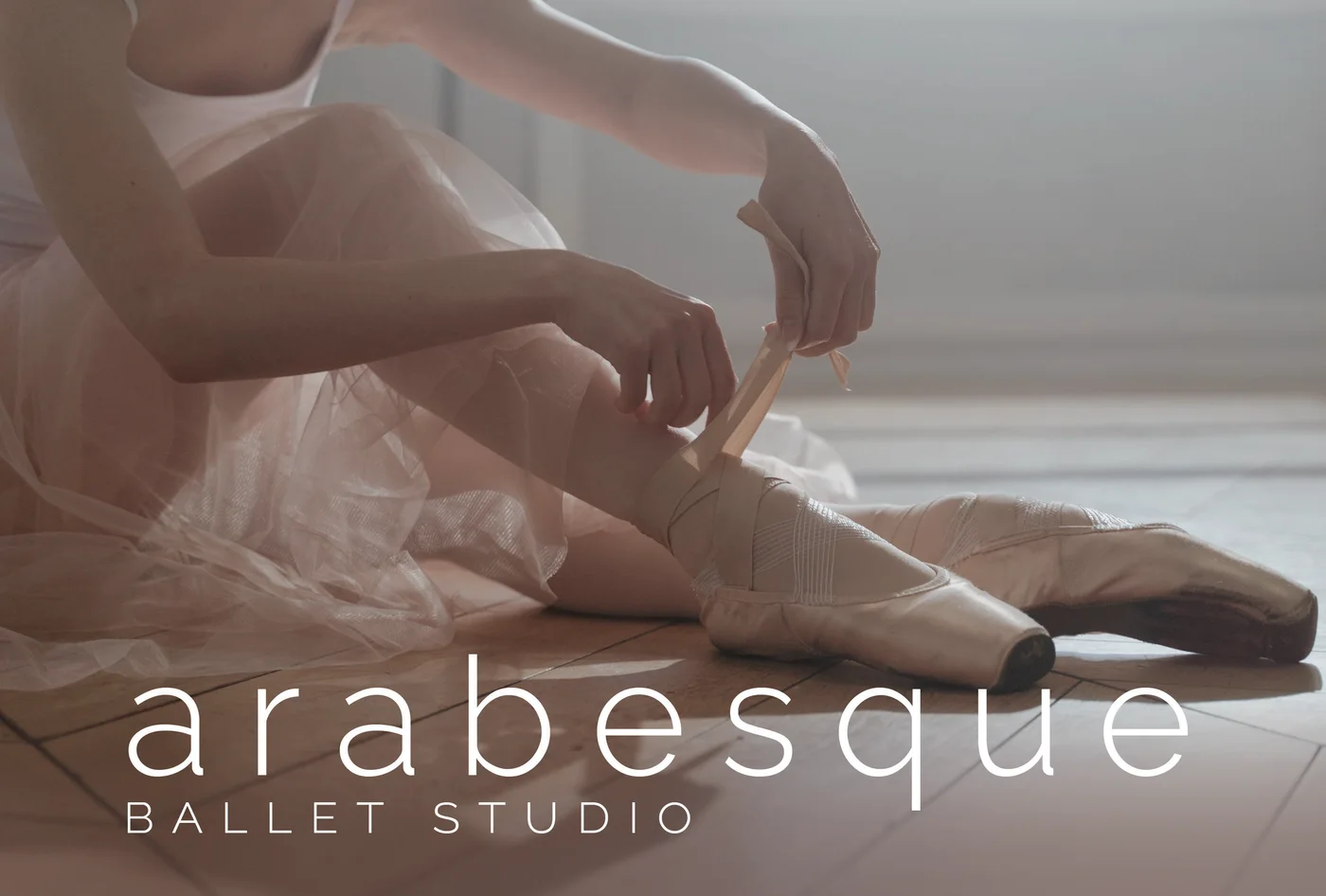 Dance studio postcard front featuring a ballet dancer.